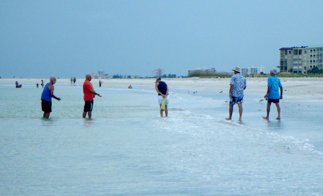 Del & Bob trying to sell sea shells at the seashore