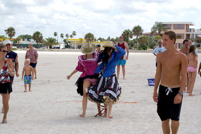 A 3-legged race in westen wear!? 