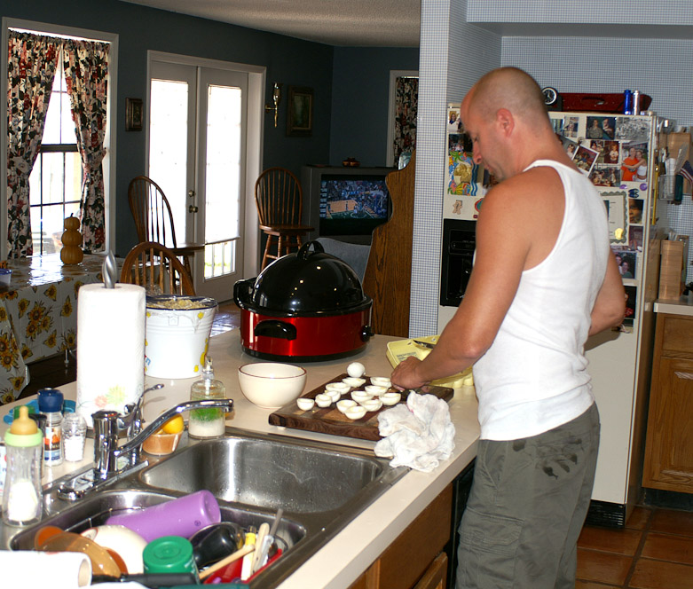 Adam starts early preparing deviled eggs