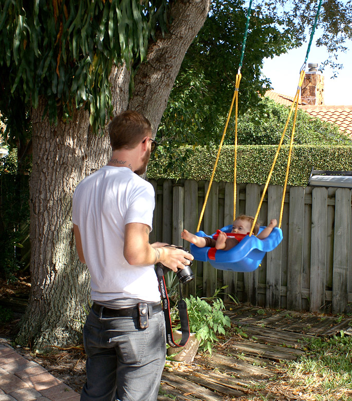 Dad works the swing.